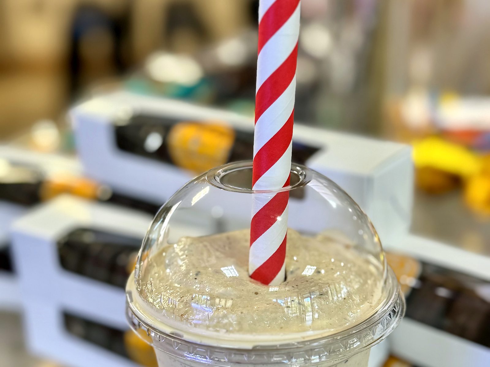 A milkshake at Enstrom, blended thick and shot through with dark flecks of cookie.
